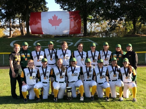 The University of Regina team poses on a field